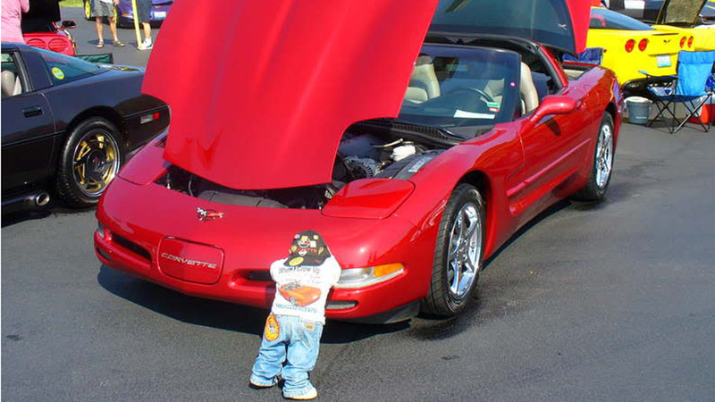 Illustration for article titled Why do car collectors put creepy dolls on their bumpers?